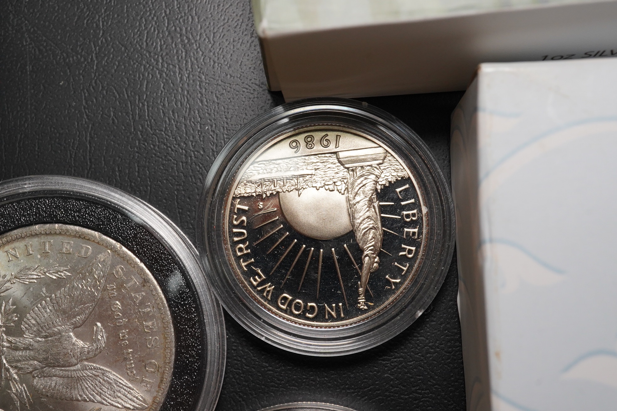 USA and Australian coins, 20th and 21st century, including Morgan dollars, 50 State commemorative quarters 19 99–2008, archival quality, Australia and Perth mint proof silver coins in cases etc., in a box